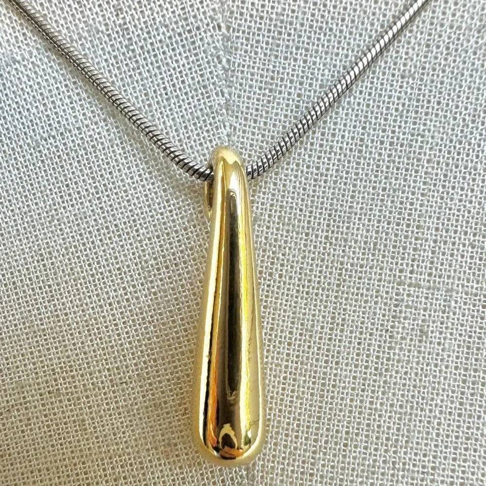 Gold tone pendant necklace